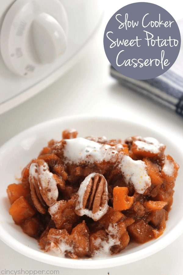 Slow Cooker Sweet Potato Casserole by Cincy Shopper served in a white bowl with melted marshmallows on top.