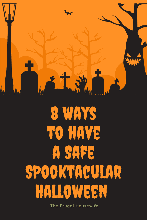 Orange background with scary cutout of cemetery scene in black.