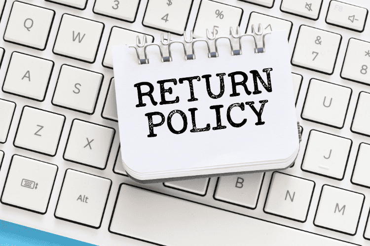 Keyboard with Return Policy on it.