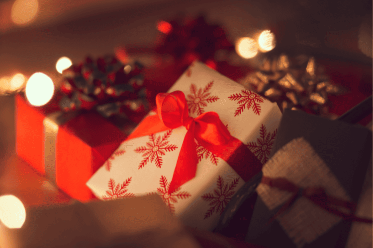 Small red presents under tree